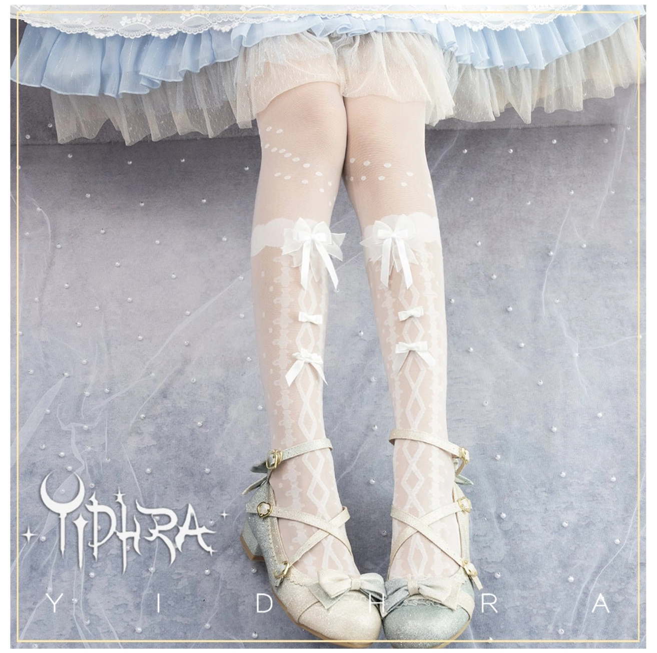 White sheer lolita mid-thigh stockings with polka dot prints and bowknot cuff decorations paired with light blue frilly lolita skirt and cross-strap shoes