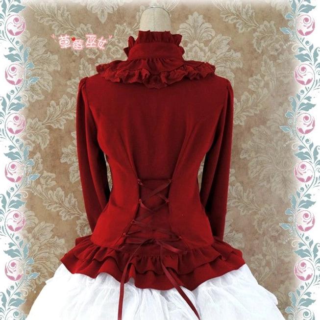 White Lolita stand collar blouse back view revealing delicate lace-up closure and ruffled hem design detail