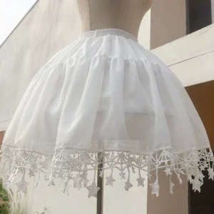 White adjustable Lolita puff hoop petticoat with star lace hem front view on dress form outdoor setting