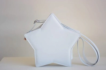 Pure white five-pointed star Lolita crossbody messenger bag front view, classic Sweet Lolita style with silver-toned adjustable shoulder strap and pristine finish