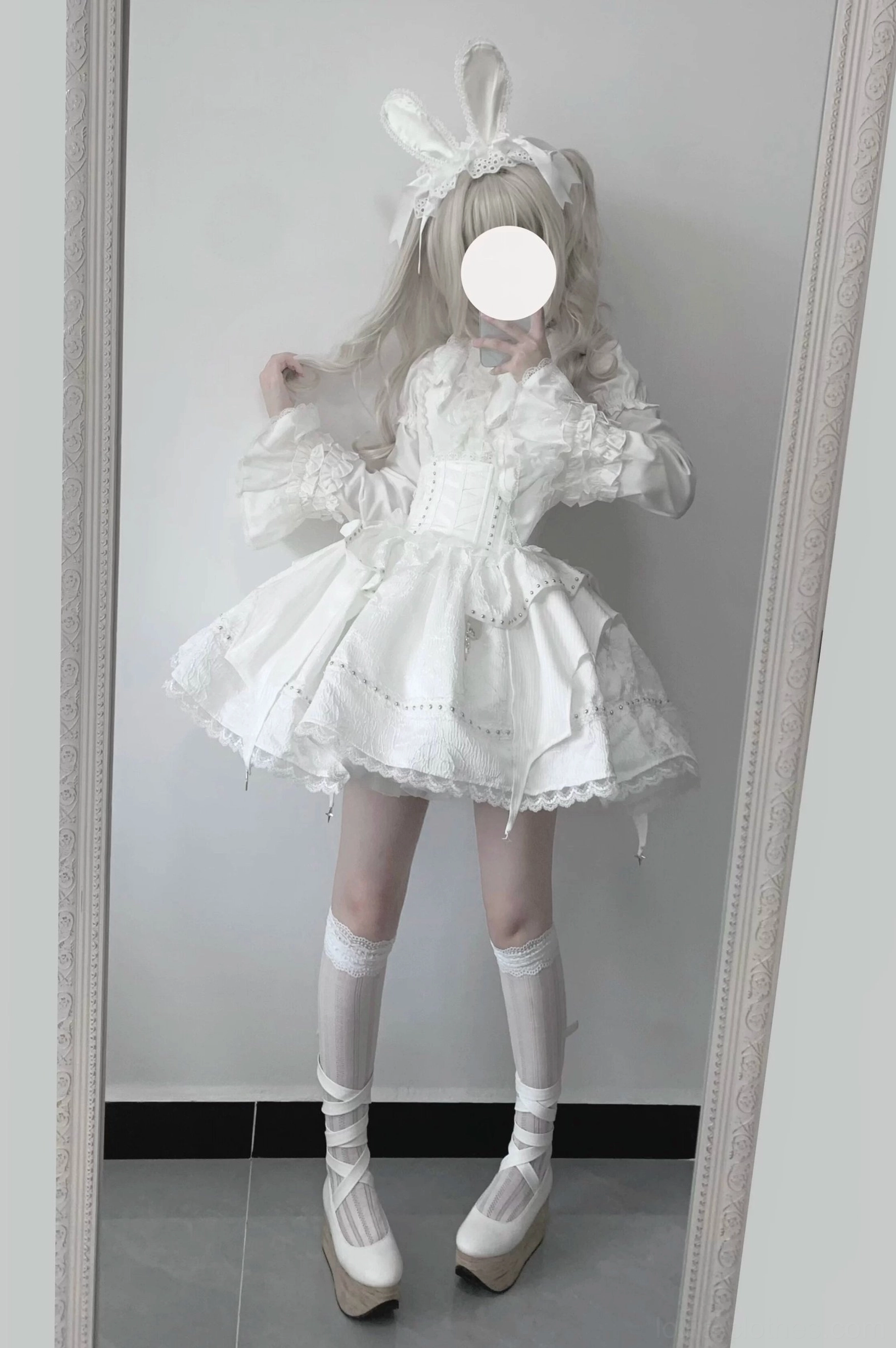Sweet gothic lolita white mini dress with puff sleeves fitted corset waist and ruffled skirt front view mirror