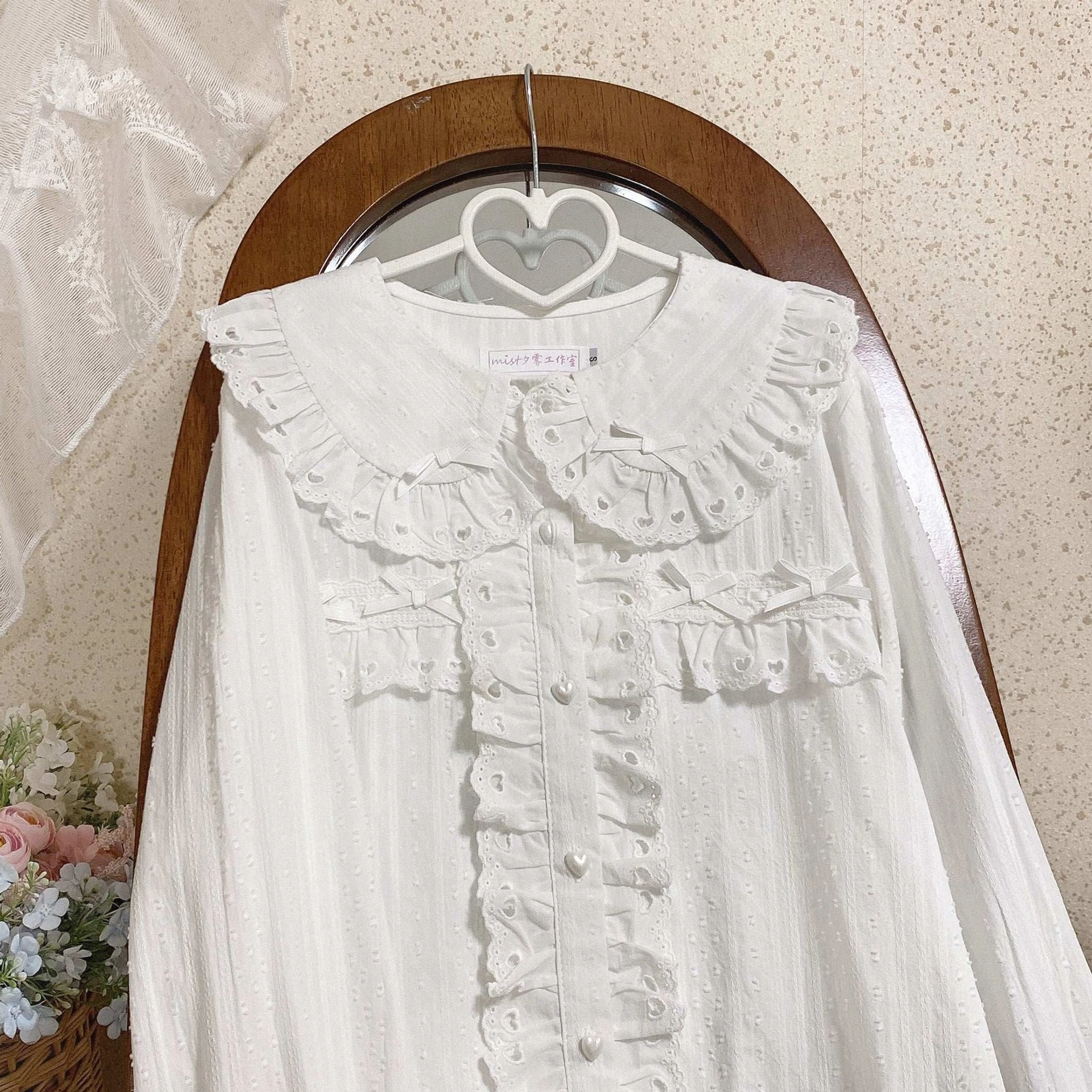 White sweet lolita doll collar blouse close-up front hanging with double-layer ruffled collar and dotted woven fabric