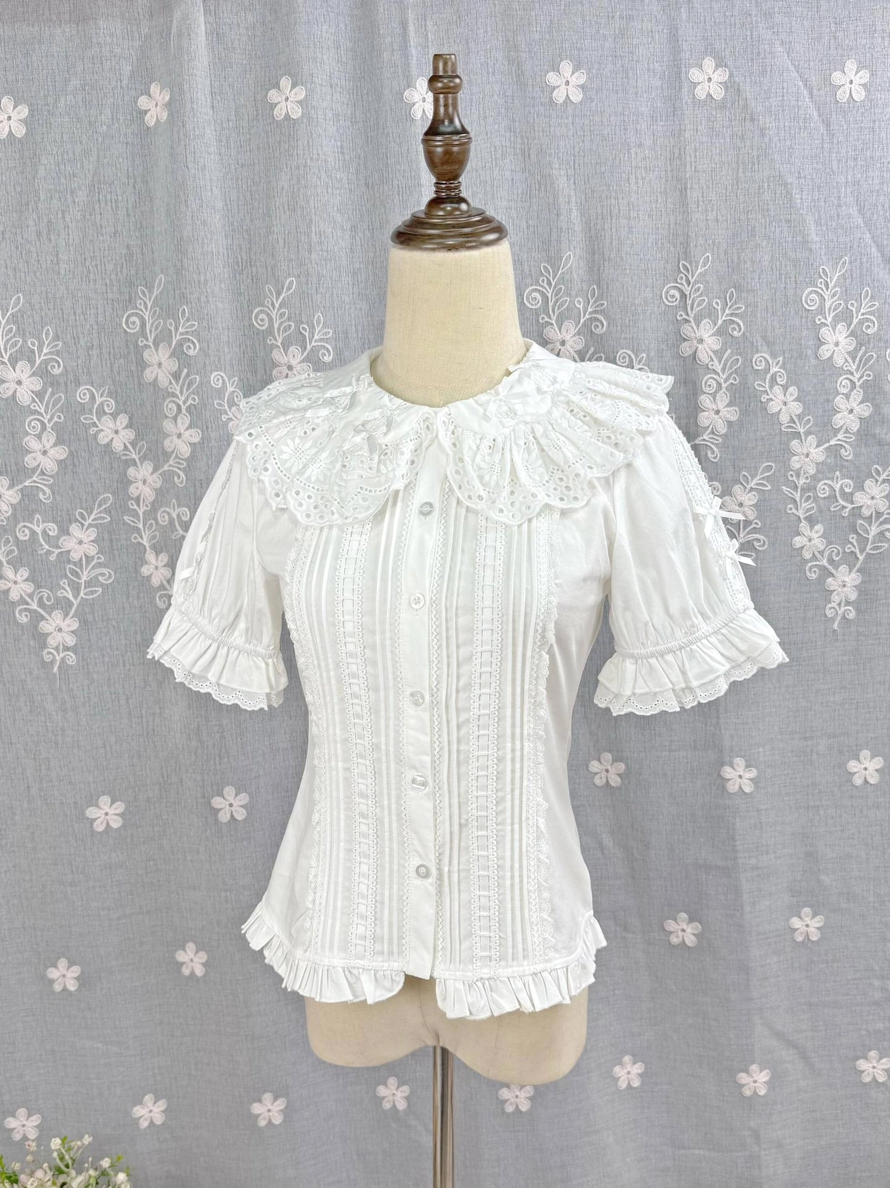 White Sweet Lolita Peter Pan collar blouse front flat display mannequin view hollow embroidered ruffled neckline