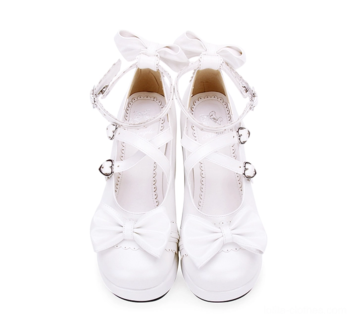 White sweet Lolita platform Mary Jane shoes front facing flat lay with heart buckle straps vamp bow and closed round toe design
