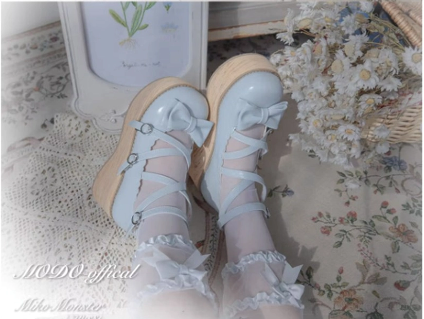 White sweet lolita platform Mary Jane shoes texture detail of glossy patent leather finish