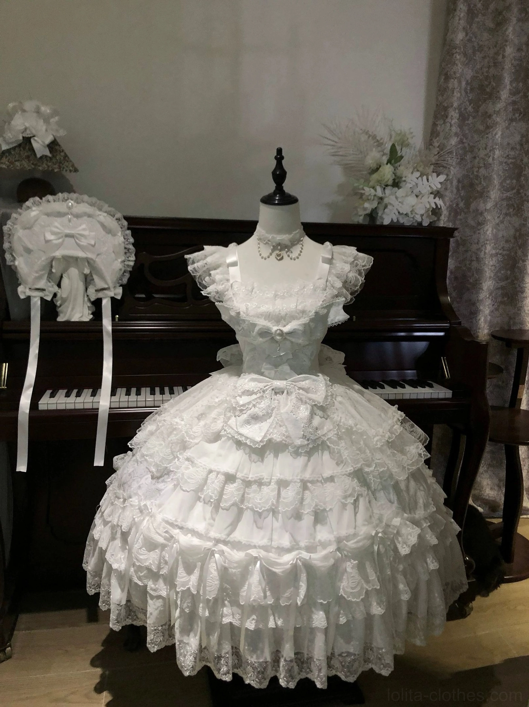 Front view of pure white sweet lolita tiered JSK dress with all-white lace design and square ruffled neckline full volume skirt