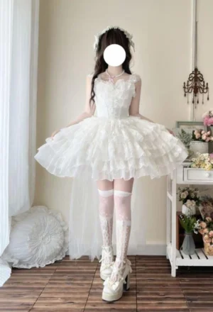 White sweet lolita wedding JSK jumper skirt with heart neckline and layered tulle skirt, front full-body view with white lace stockings and platform heels