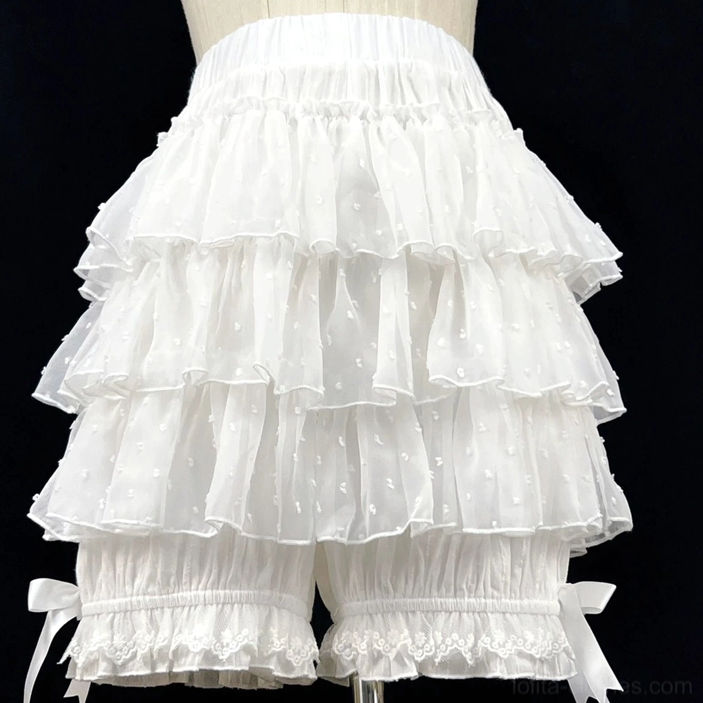 White multi-layer dotted sheer tulle lolita bloomers front flat view on dress form mannequin showing three-tier ruffles lace-trimmed leg openings and elastic waistband construction
