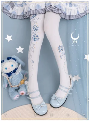 White thick velvet Lolita pantyhose with blue and light gold geometric flower vine print on model wearing blue-white Lolita skirt and light blue Mary Jane shoes