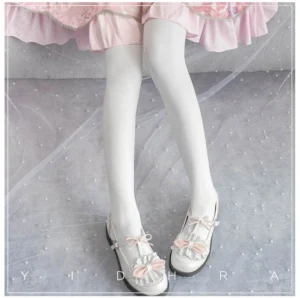 Premium white velvet Lolita tights styled with pink frilly JSK skirt and bow Mary Jane shoes - sweet Lolita coordinate front view