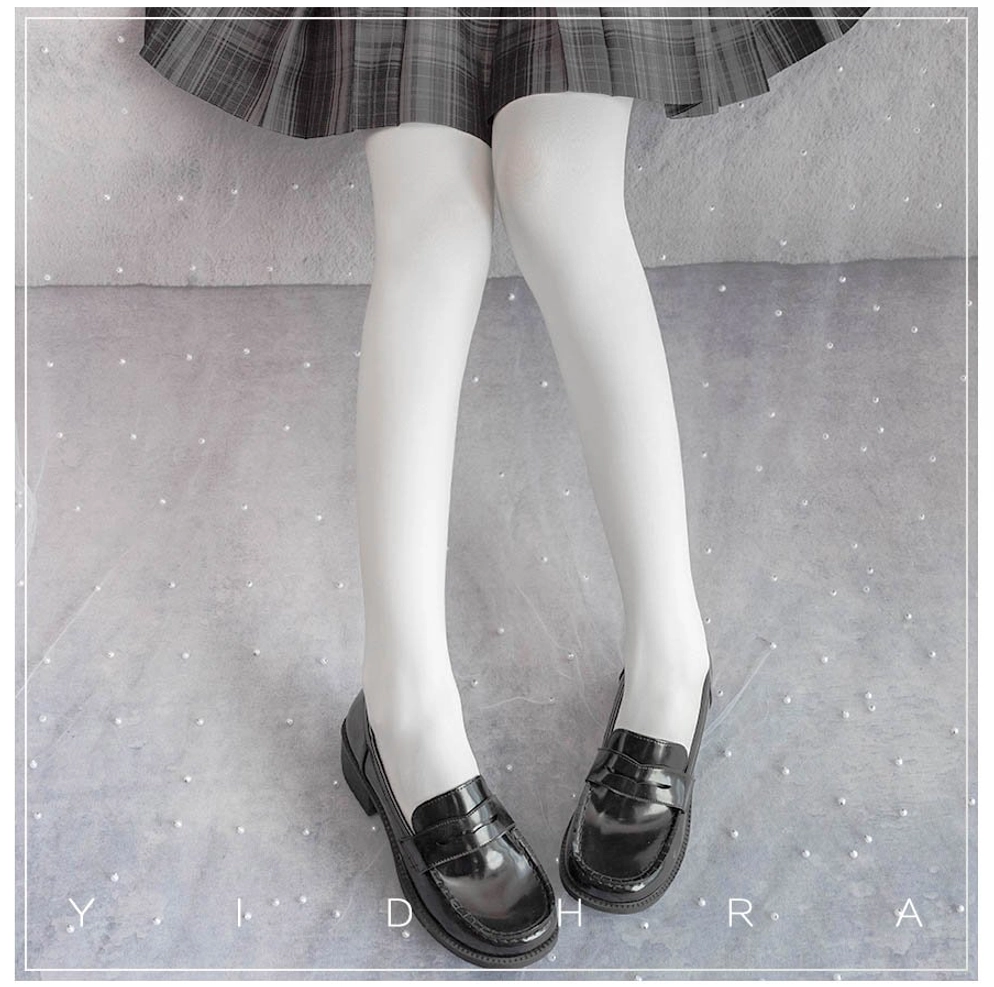 White 120D velvet Lolita tights layered with dark gray plaid JK skirt - versatile cross-fashion aesthetic