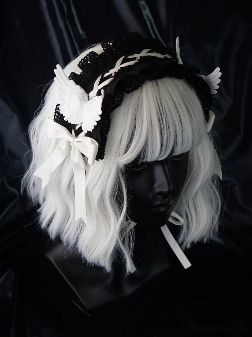 White wing version gothic lolita hairband front close-up display mannequin with black lace base white crisscross straps white wing ornaments white bow