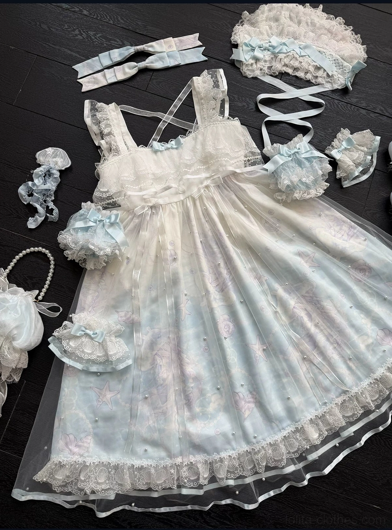 Windchime Jellyfish sweet lolita arm sleeves and coordinating accessories laid flat showing ruffled cuff details, lace trim, and jellyfish motif embroidery on premium polyester