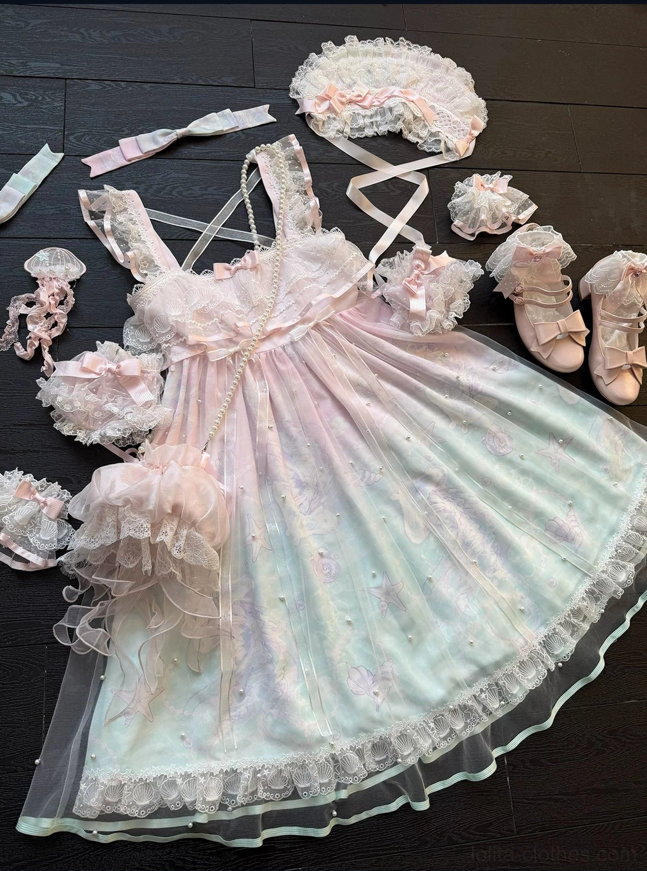 Windchime Jellyfish sweet lolita bonnet and arm sleeves accessory set detail showing jellyfish embroidery, ruffled lace trim, and delicate construction on premium polyester fabric