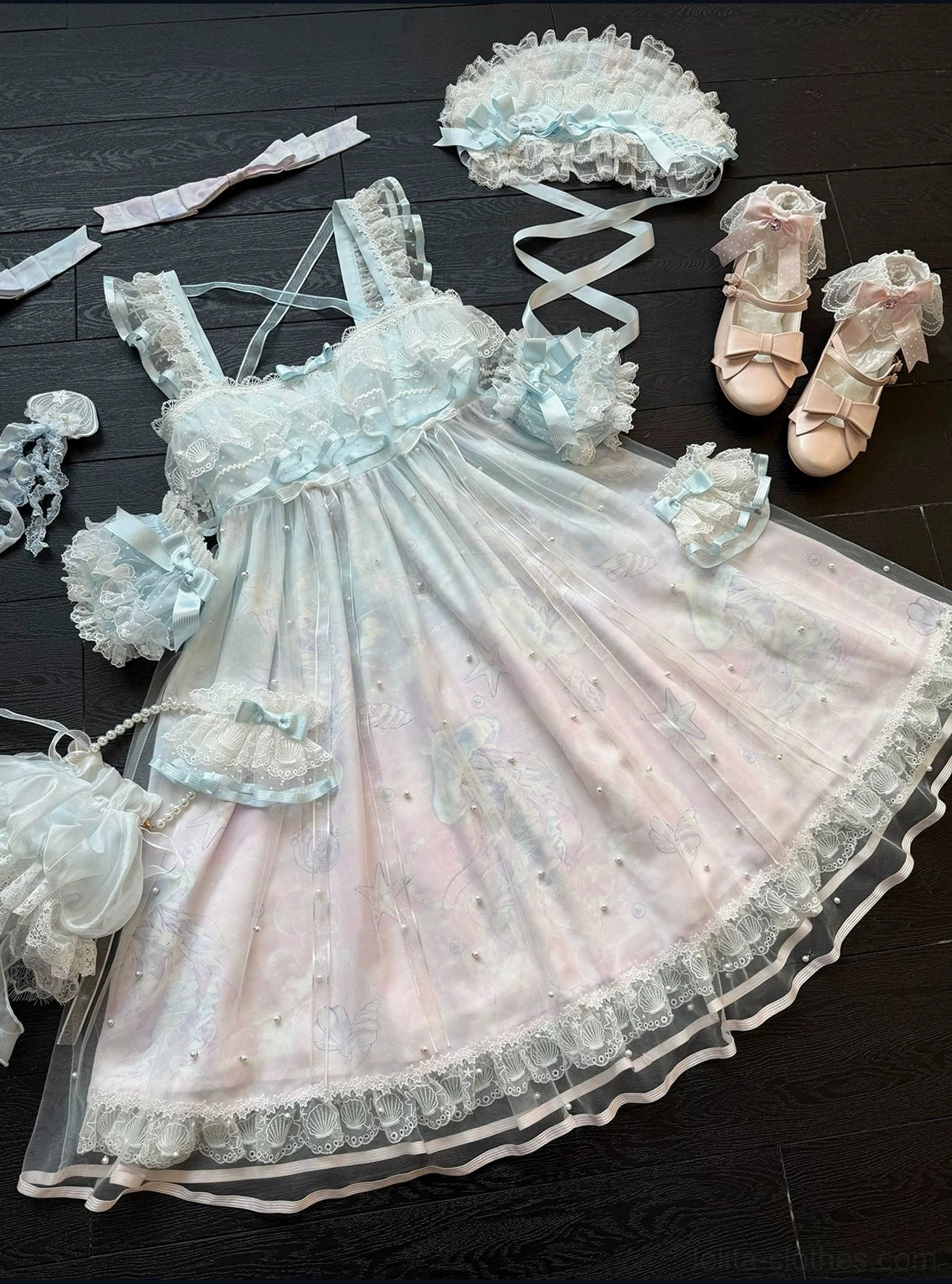 Jellyfish-embroidered brooches and hair clip accessories from Windchime collection showing intricate tulle appliqué work and ocean-themed design in multiple pastel colors