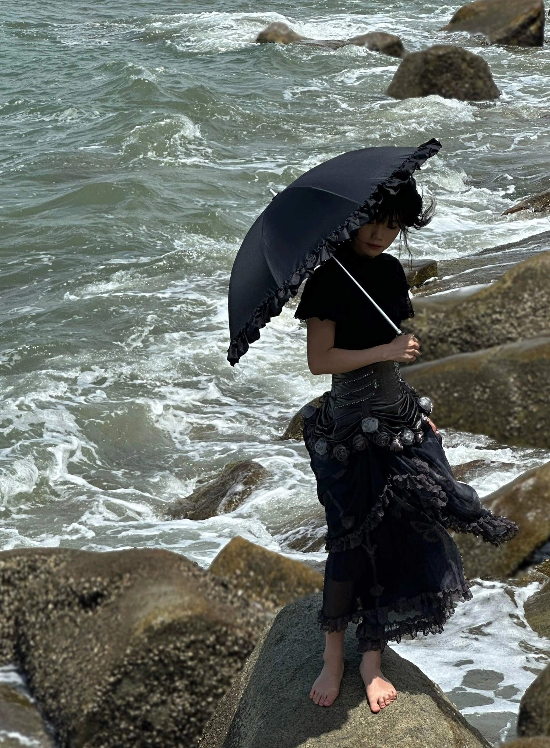 Foldable Lolita parasol with window print geometric pattern and opaque light-blocking coating on black fabric, studio display showing architectural print design
