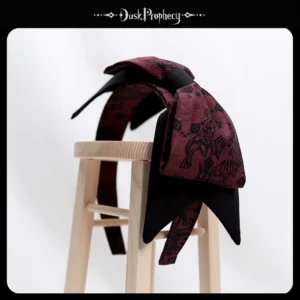 Wine red floral printed lolita bow headband with layered oversized black fabric tails, vintage aesthetic design