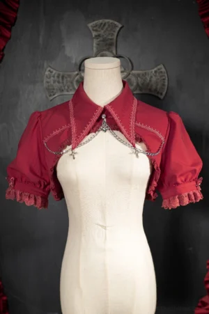 Wine red gothic lolita bubble sleeve bolero with pointed collar and chain cross pendant front view on mannequin