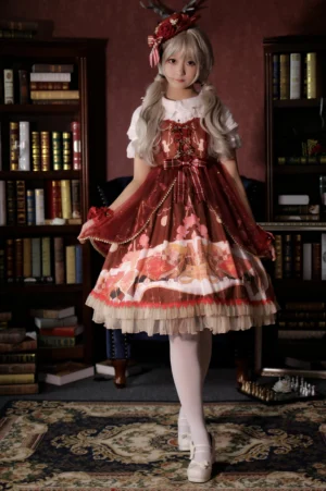 Wine red sweet lolita JSK dress with clock and floral print displayed on blonde model in vintage library setting, featuring ruffled tulle hemline and white lace inner blouse