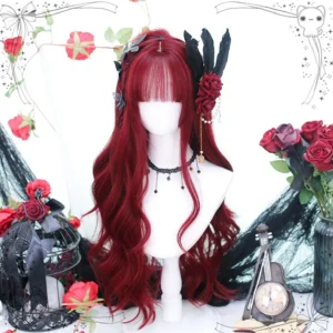 Wine-red long curly lolita wig front view with neat air bangs and full loose curly hair, styled with red flower hair accessory, black drop pendant choker on mannequin with gothic retro props and red roses