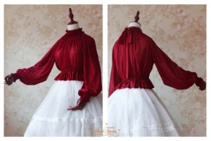 Wine red reversible long puff sleeve lolita blouse with open-mouth sleeves, displayed on mannequin in three-quarter front view, paired with white tulle midi skirt showing frilled stand collar and shirred bodice detail