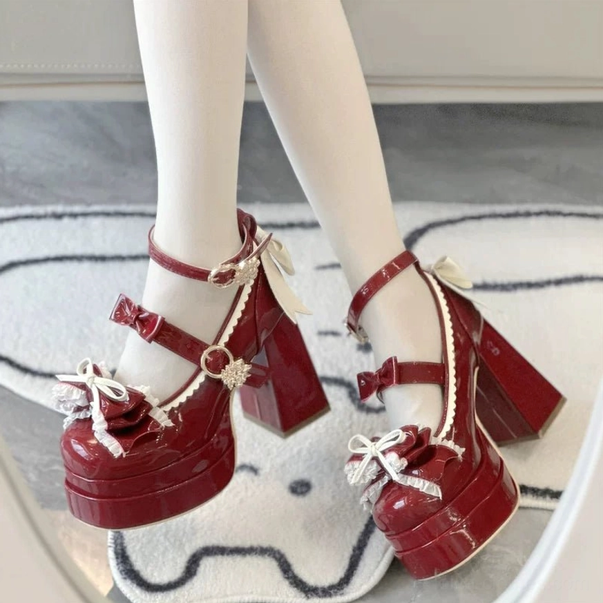Wine red sweet Lolita patent leather platform heels on-foot wearing with bows buckles and ruffle details