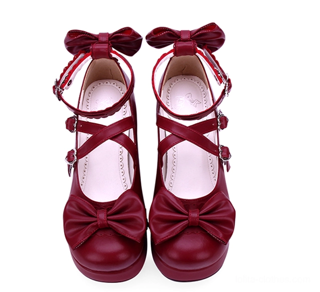 Wine red sweet Lolita platform Mary Jane shoes front flat lay showcasing double ankle straps heart buckles large vamp and heel bows
