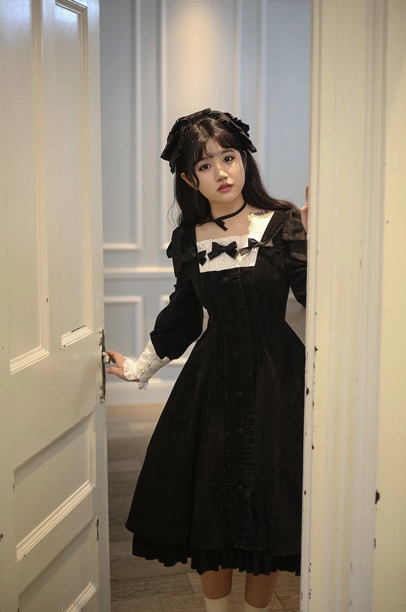 Wine red velvet Lolita OP dress worn by model in Lolita community coordinate setting with complementary accessories including socks, platform shoes, and coordinated headpiece
