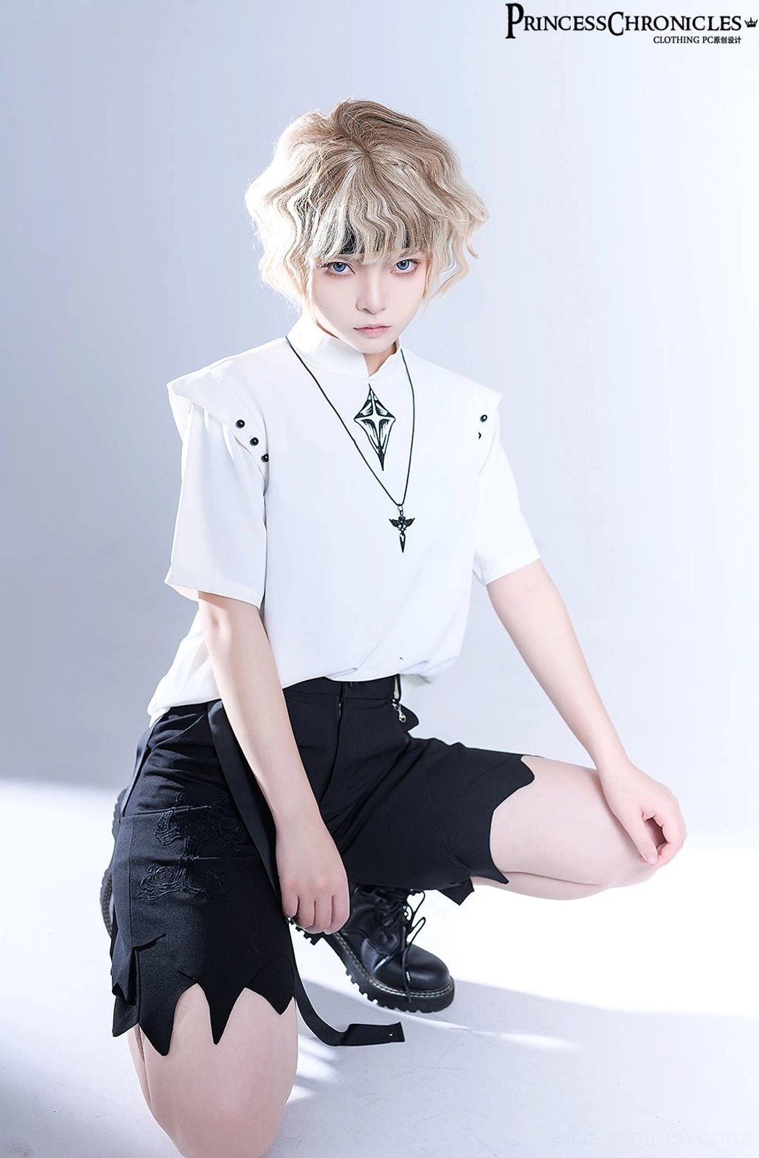 Gothic lolita necklace styled with ouji fashion coordinate short-haired model full-body squatting portrait studio