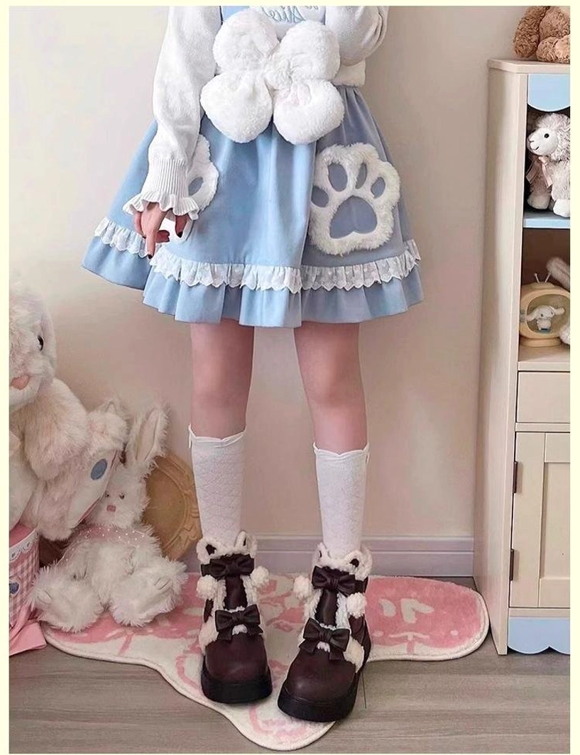 Winter lolita boots pom-pom accents and bow decorations texture detail photography