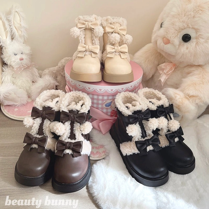 Winter cute lolita short snow boots in three color options with bow decorations and fuzzy shearling trims on plush surface with stuffed animals