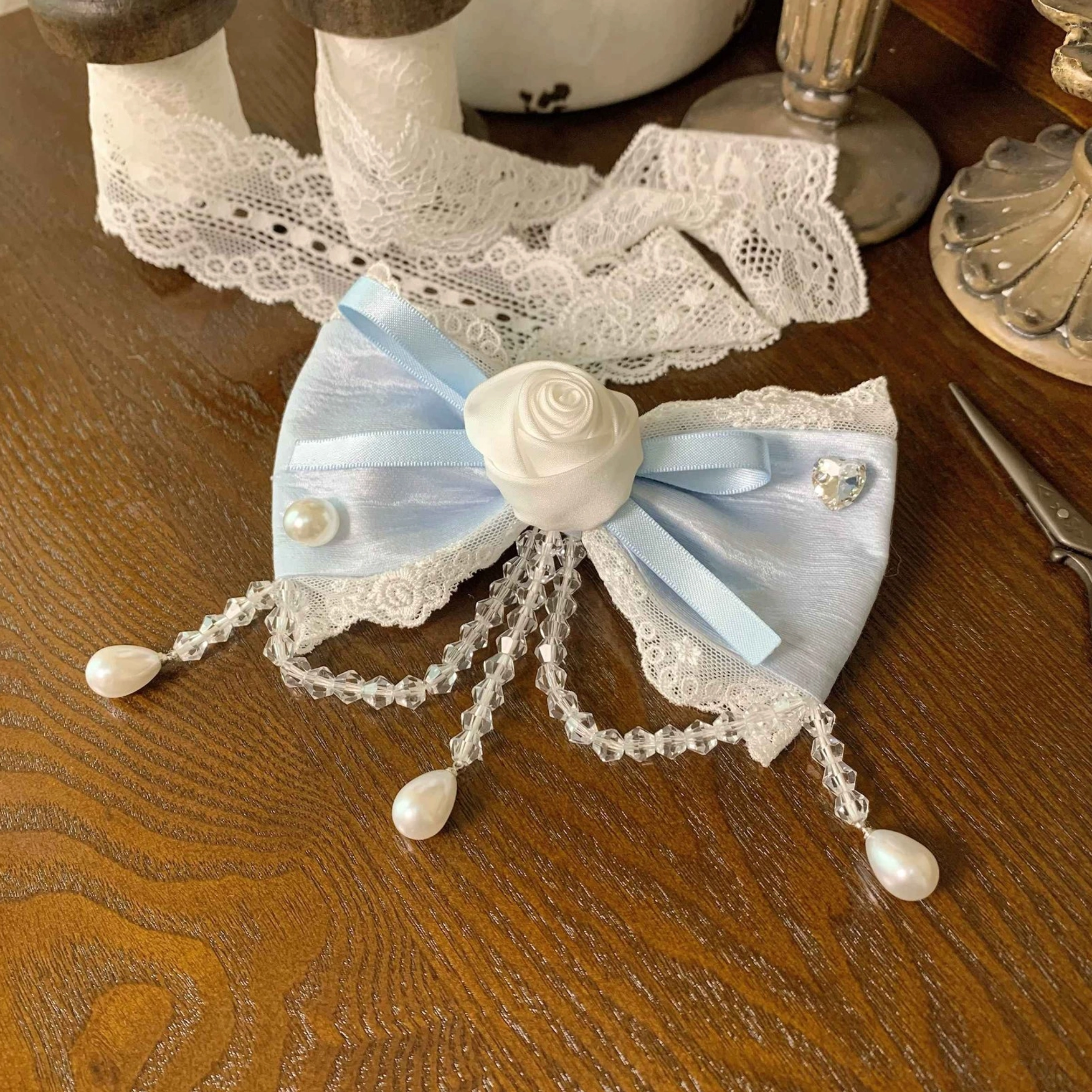 Wishing Star Baby Blue Side Clip Brooch 2-in-1 flat lay - delicate lolita hair clip with white rose flower lace trim pearl and beaded pendant details