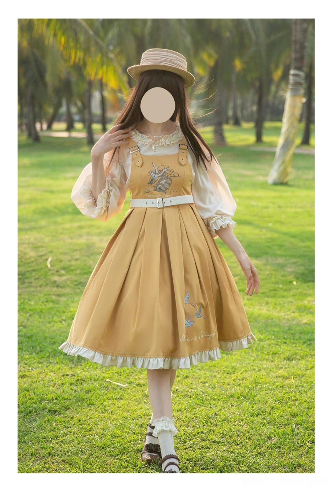 Yellow plus size elegant Lolita JSK dress with flying bird embroidery worn outdoors in tropical setting with matching coordinated inner blouse featuring lace-trimmed lantern sleeves
