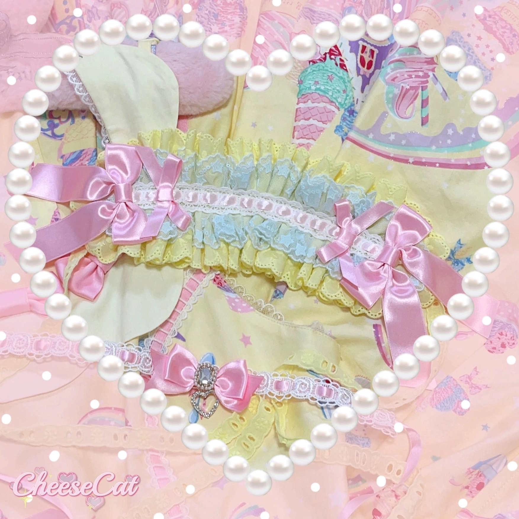 Yellow and blue sweet Lolita ruffled lace headband with pink satin bow worn by model demonstrating styling on curled hair