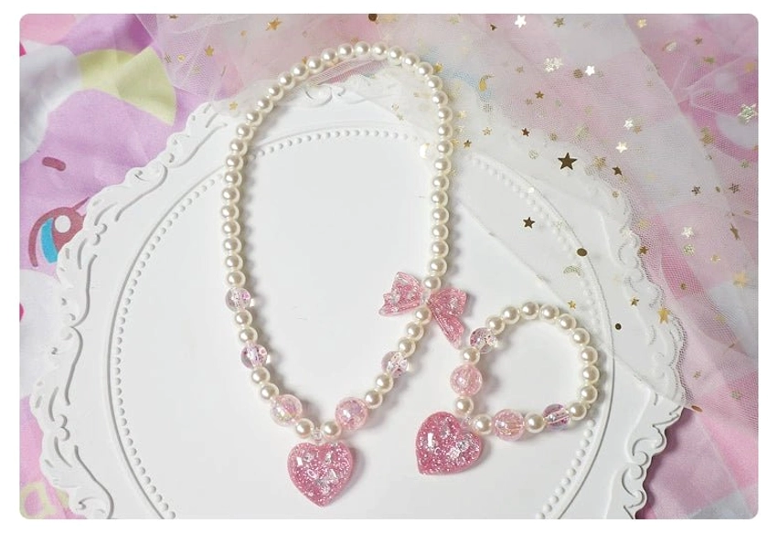 Yellow heart charm pearl gradient choker and beaded bracelet lolita jewelry set on lace display tray