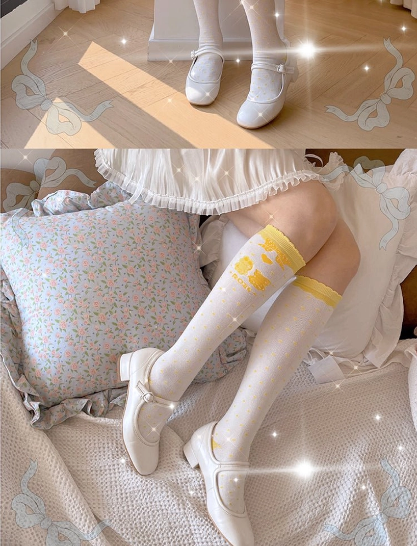 Yellow lolita calf socks detailed view showing cartoon bear bunny graphics polka dot pattern soft combed cotton spandex blend