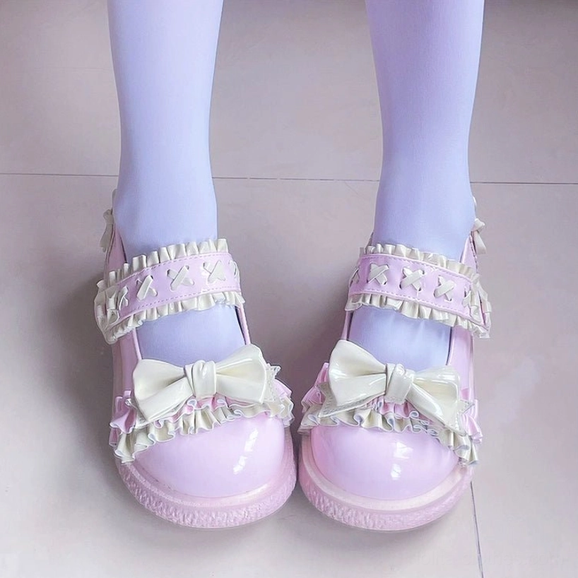 Yellow pink candy-colored Lolita shoes on feet displaying magic sticker closure system, round toe profile and shallow mouth design for easy adjustable fit