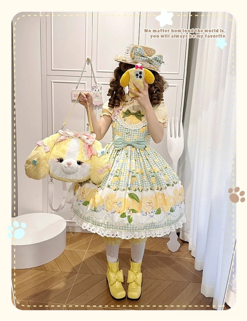 Yellow puppy plush lolita backpack side view model wearing yellow lemon-themed sweet lolita dress convertible backpack carrying style