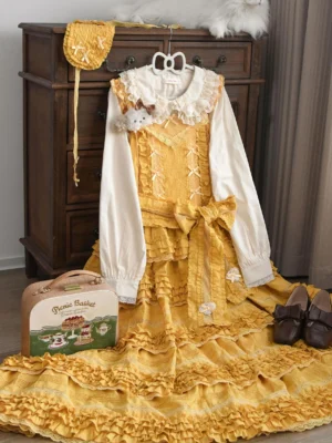 Yellow and white classic Lolita blouse and dress set featuring Peter Pan collar with ruffled lace trim, puffy sleeves, and multi-layered ruffled skirt with large waist bow, styled with vintage wooden dresser accessories